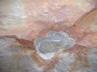 a rusty lump, similar to a Moqui Marble