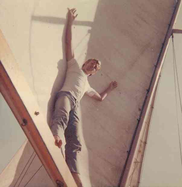 old sailboat young man on sail